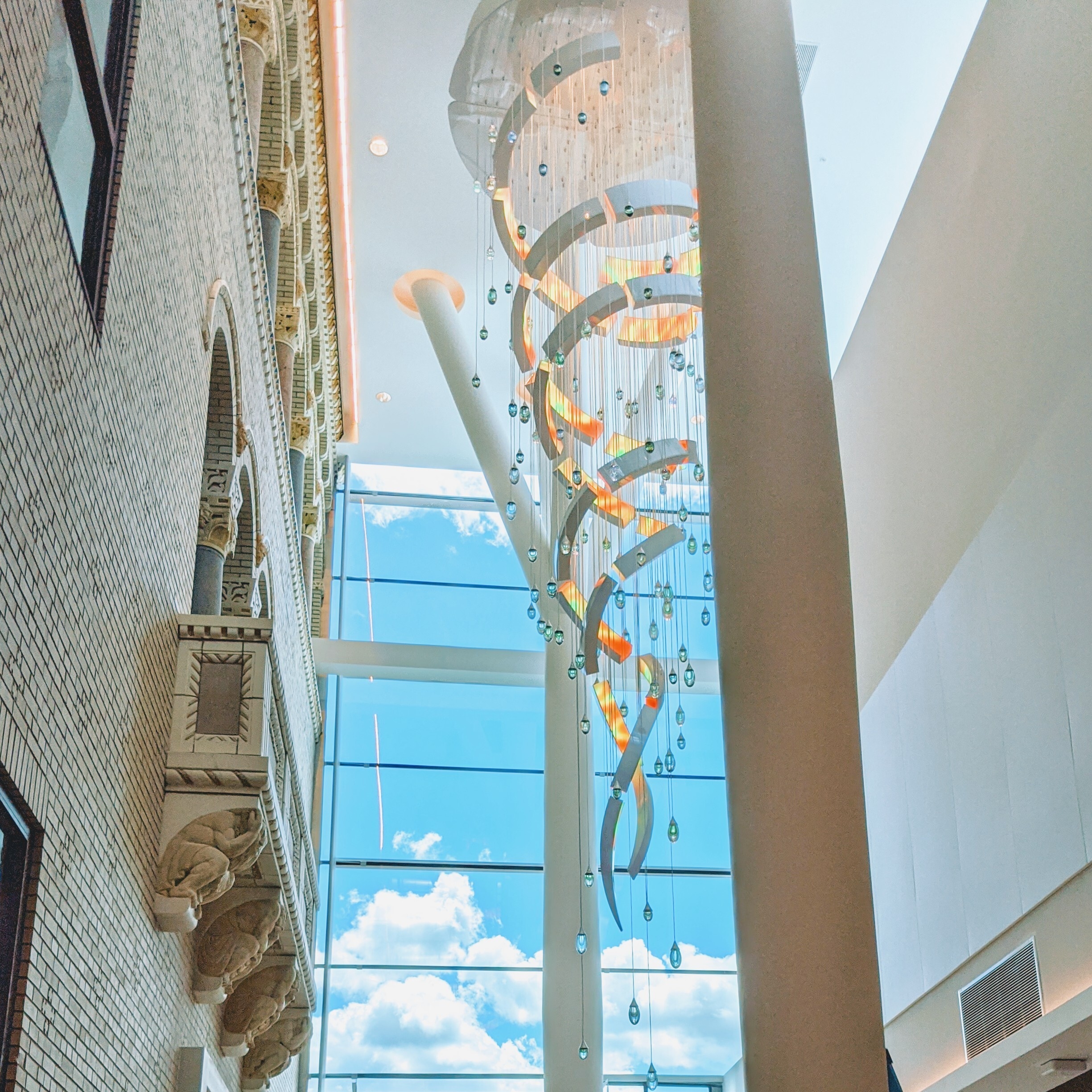 Image of the hanging dual-helix light sculpture in the atrium of Allegheny General Hospital's new atrium addition, the Academic Cancer Center.